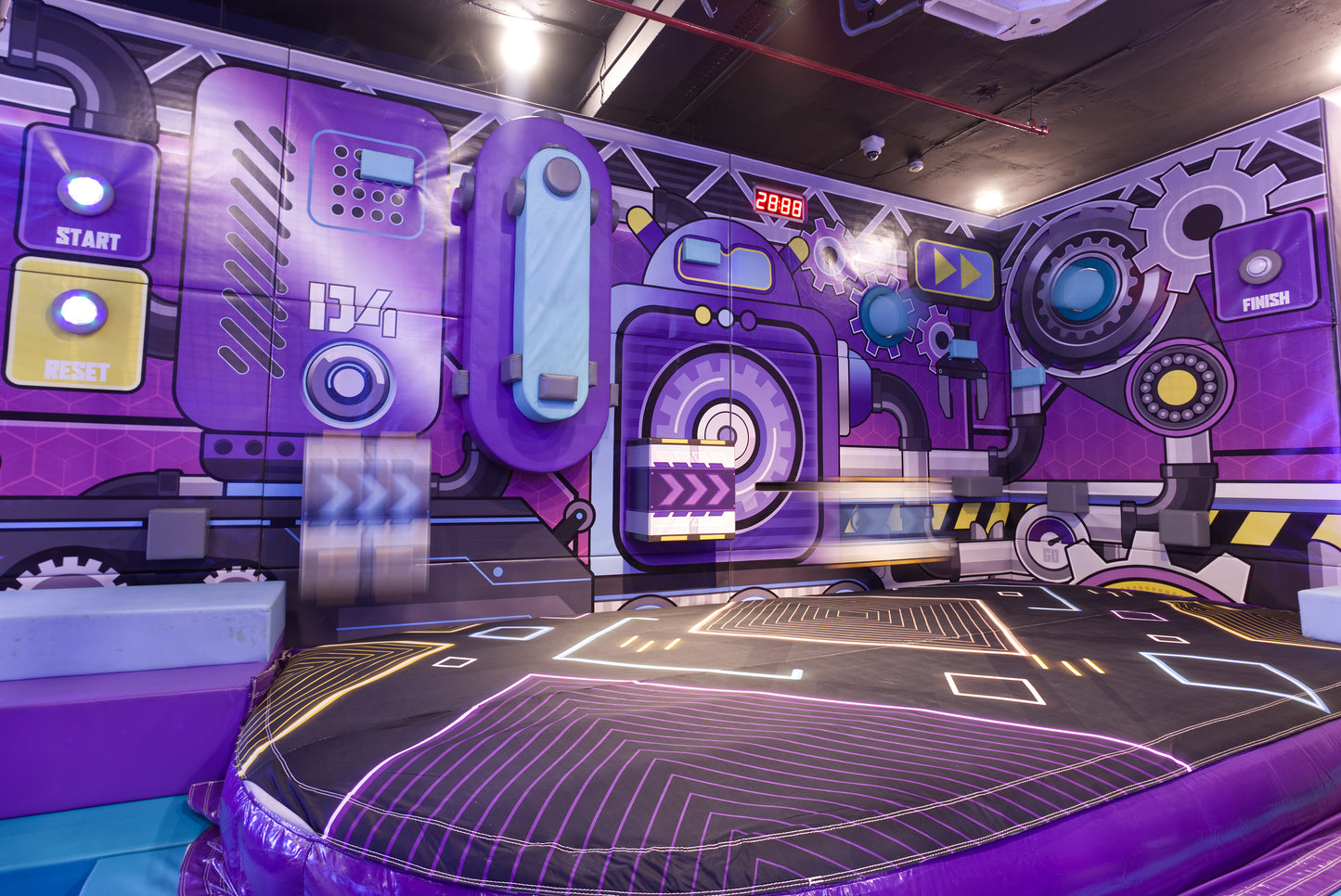 Colorful indoor play area with futuristic design elements