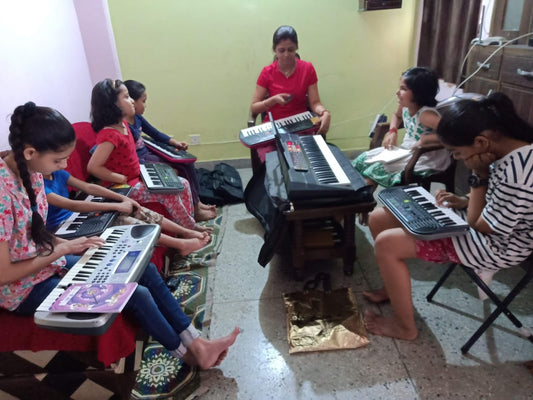 Swar Sudha Music Classes for Classical Vocals Harmonium Keyboard | Sector 56 Gurgaon