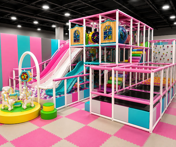 A colorful indoor playground with slides, ball pits, and climbing structures for children.