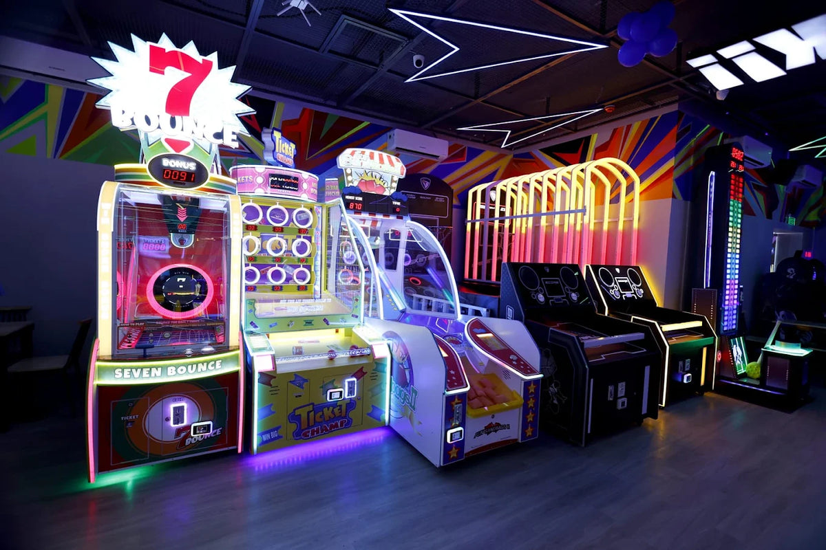 Arcade with colorful, glowing games like "Seven Bounce" and "Ticket Champ."