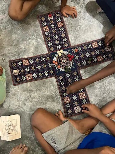 Kids playing an ancient strategy board game