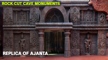 A replica of Ajanta Caves with intricate carvings and statues.