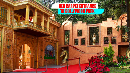 A red carpet leads to a Bollywood-themed park entrance with ornate architecture and golden statues.