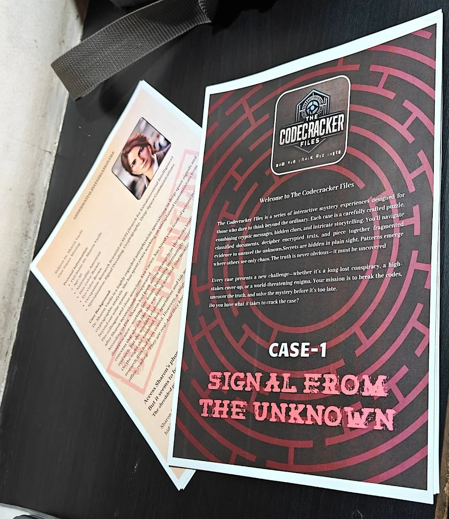Two game booklets for "The Codecracker Files" mystery game, one titled "Signal from the Unknown."