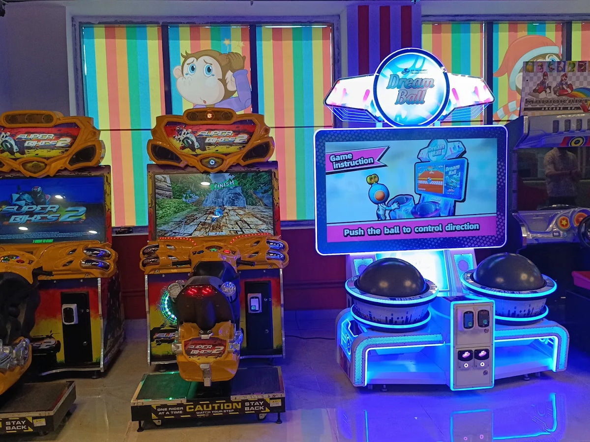 Arcade with motorcycle racing games and a "Dream Ball" game.