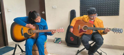 Hello Guitar! Academy for Guitar Classes | SARE Homes Club Sector 92 Gurgaon - ActivityKidz