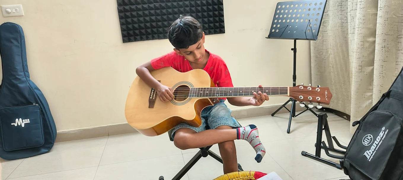 Hello Guitar! Academy for Guitar Classes | SARE Homes Club Sector 92 Gurgaon - ActivityKidz