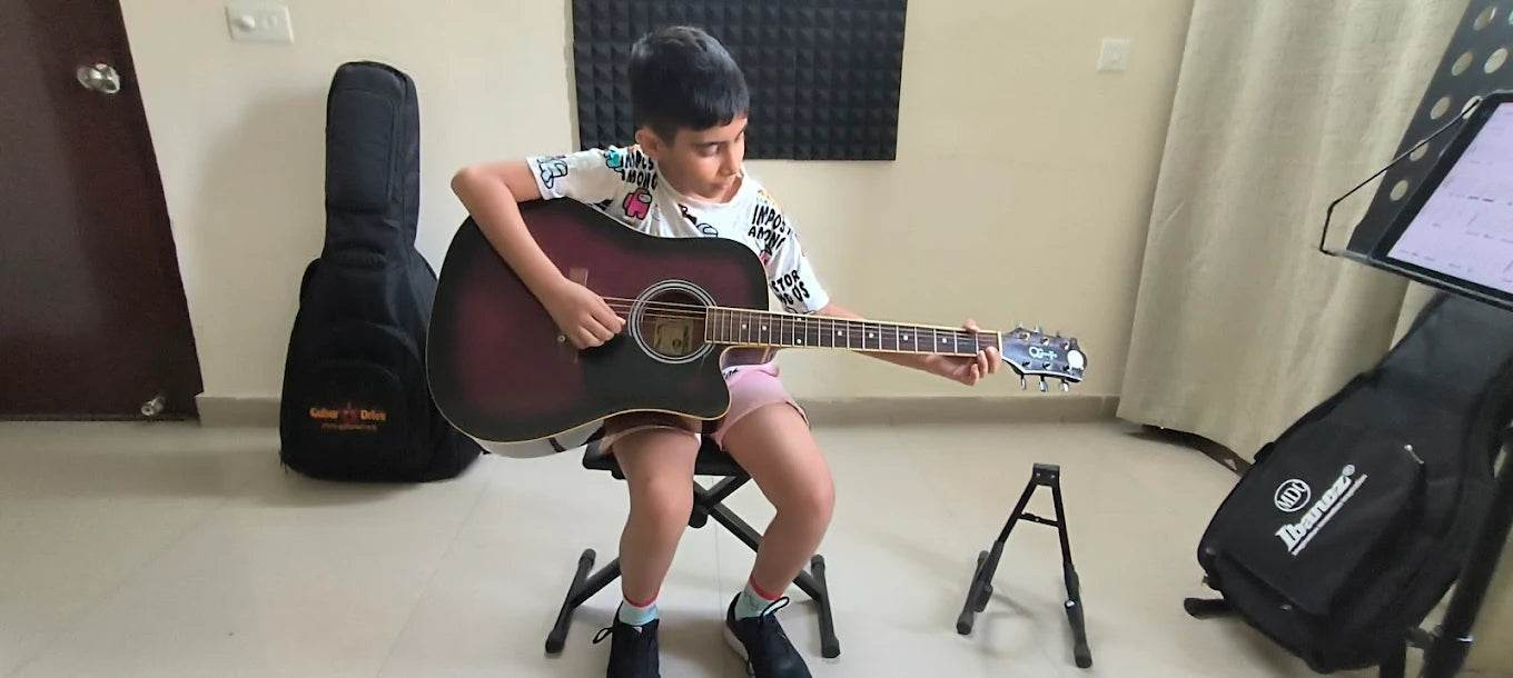 Hello Guitar! Academy for Guitar Classes | SARE Homes Club Sector 92 Gurgaon - ActivityKidz