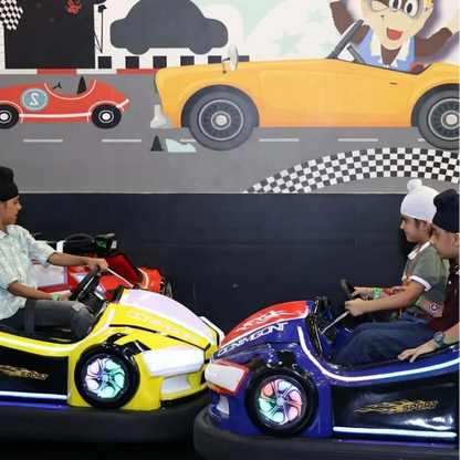 Children in bumper cars at an amusement park.