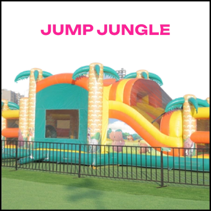 A colorful inflatable jungle-themed bounce house with a slide, set up on a grassy field.