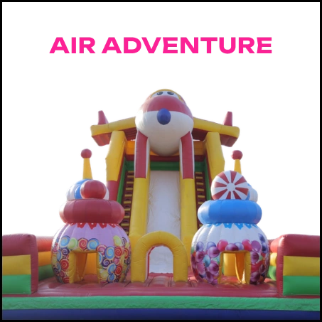 An inflatable "Air Adventure" playground with a slide and colorful candy-themed structures.