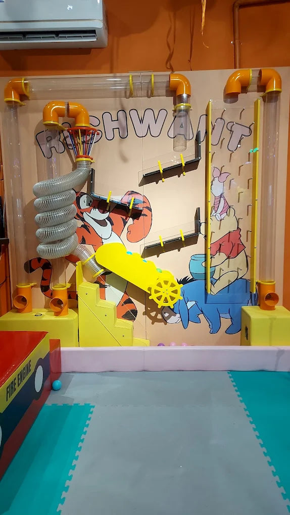 A colorful ball maze with Winnie the Pooh characters, designed for young children.
