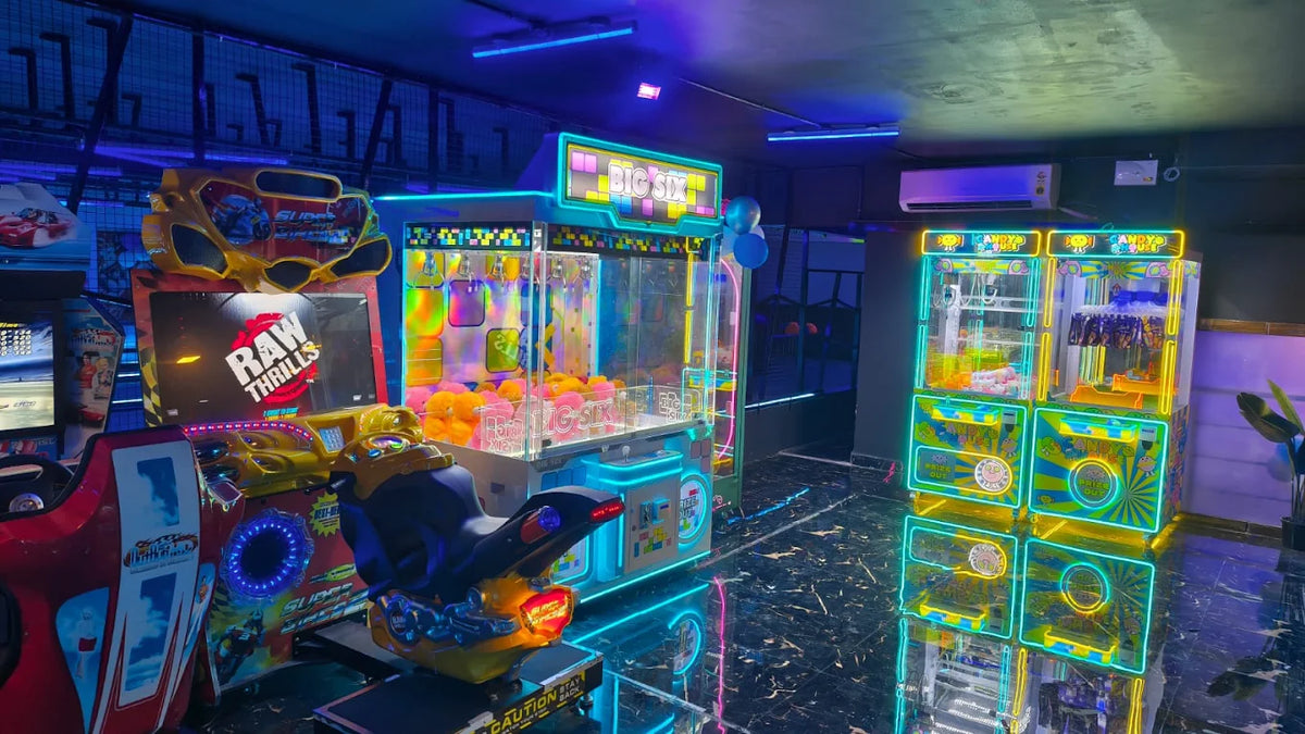 An arcade with neon lights and various games, including claw machines and racing simulators.