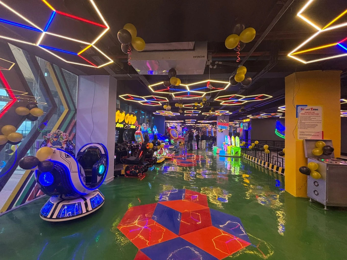 Colorful indoor play area with arcade games and vibrant decorations.