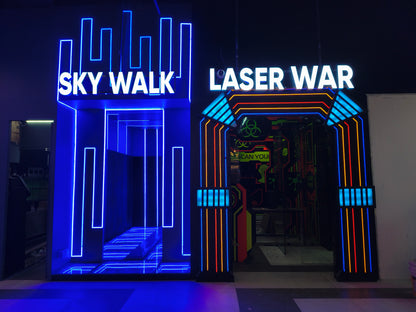 Neon-lit entrances to "Sky Walk" and "Laser War" attractions.