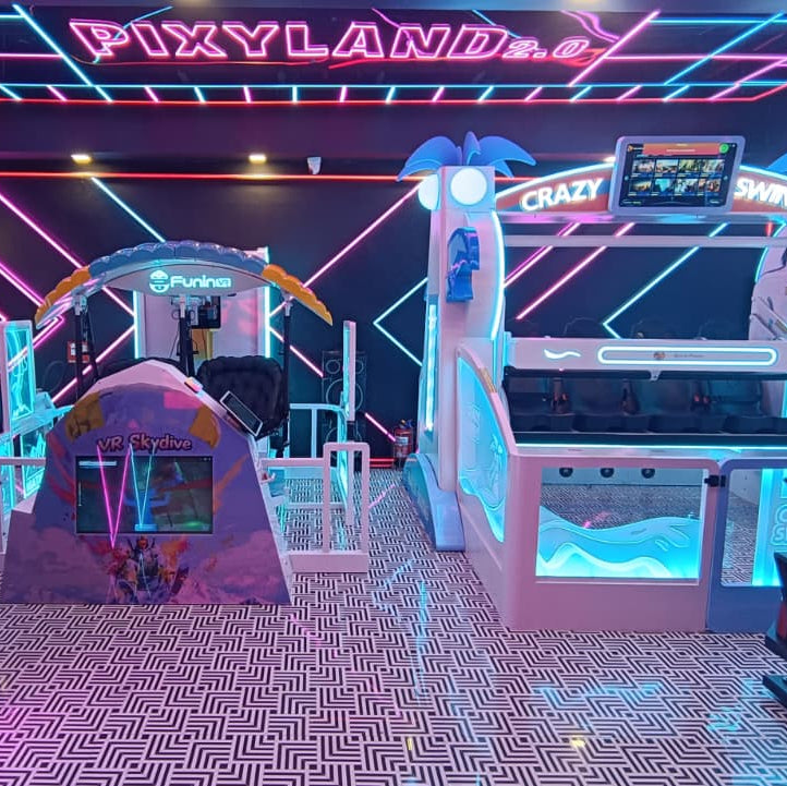 VR arcade with neon lights, featuring a skydive simulator and a "Crazy Swing" ride.