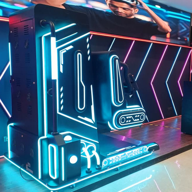A young man plays a futuristic VR game in a neon-lit arcade.