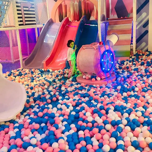 Children's play area with colorful ball pit and slide