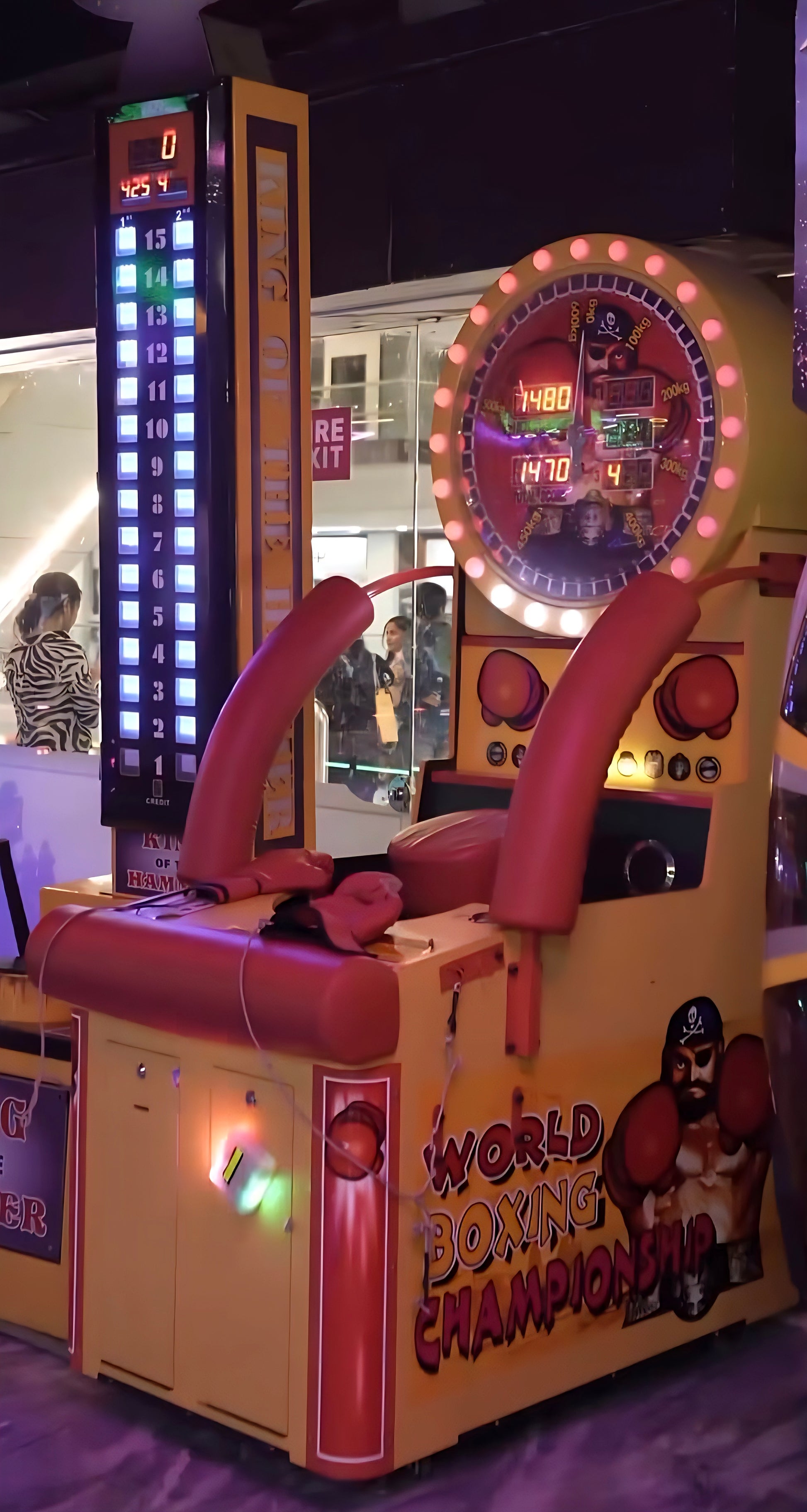A boxing arcade game with a digital score display and a pirate boxer graphic.