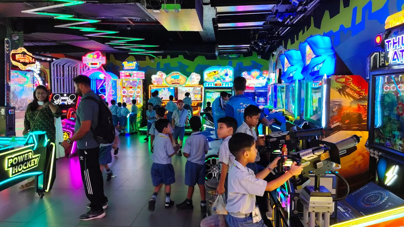 Children playing in a vibrant arcade with colorful lights and games.