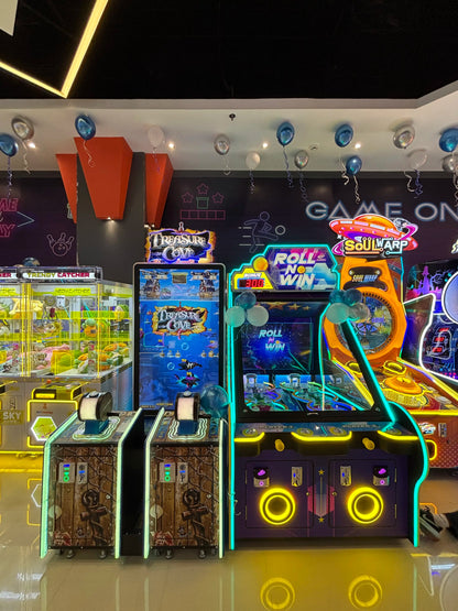 Arcade games with bright lights and balloons, suggesting a fun atmosphere for young people.