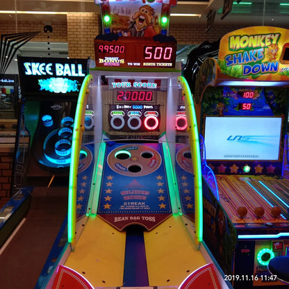 Arcade game area with Skee-Ball and Monkey Shake Down machines.