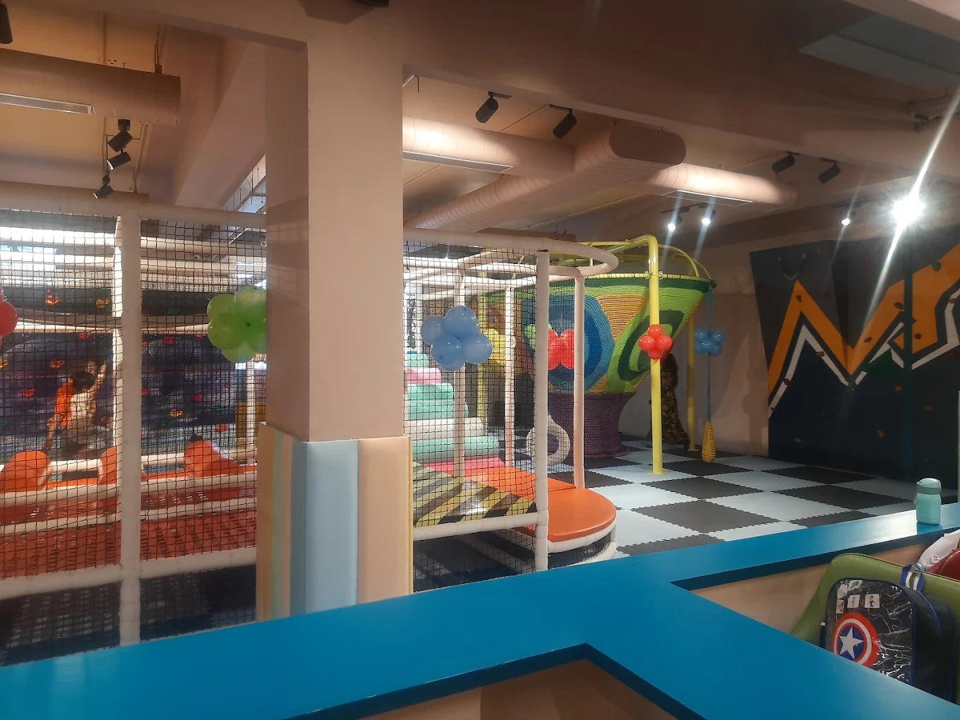 Bright indoor play zone with cushioned climbing structures and vibrant balloons at Walk to Wonderland Chhatarpur