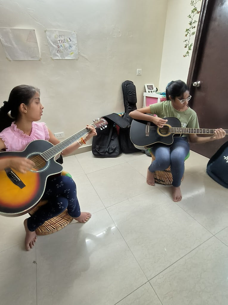 Hello Guitar! Academy for Guitar Classes | SARE Homes Club Sector 92 Gurgaon