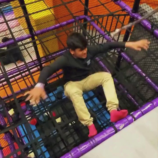 This indoor trampoline park offers a vibrant and energetic atmosphere for all ages. Children and adults alike can enjoy a variety of attractions, including trampolines, climbing walls, and a ball pit. The colorful environment and diverse activities create a fun-filled experience for families and friends.