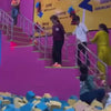 Kids and adults enjoying indoor trampoline park with wall jumps, foam pit and high-energy activities, exciting play area designed for active fun and fitness.
