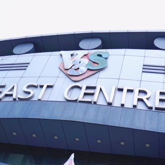 Kids and adults enjoying trampoline, wall climbing, and VR games at an indoor arcade play zone, offering adventure activities and family entertainment.