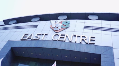 Kids and adults enjoying trampoline, wall climbing, and VR games at an indoor arcade play zone, offering adventure activities and family entertainment.