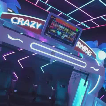 A group of young adults experiences a thrilling VR adventure at Pixyland, a neon-lit arcade. They are seated in futuristic motion simulators, wearing VR headsets, ready for an immersive "Crazy Swing" or "VR Skydive" experience. The vibrant atmosphere is amplified by glowing lights and exciting arcade games.