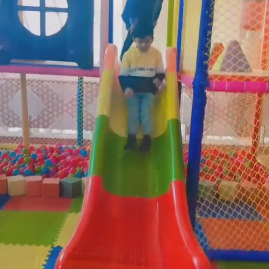 Indoor kids play area featuring trampoline fun, wall climbing activities, and arcade play zone games for energetic and safe entertainment.