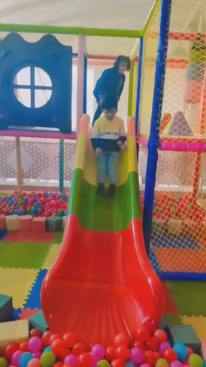 Indoor kids play area featuring trampoline fun, wall climbing activities, and arcade play zone games for energetic and safe entertainment.