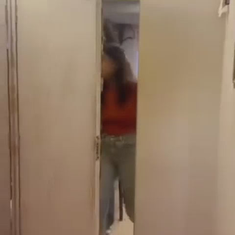 Two young women are engaged in a scavenger hunt or escape room challenge. They navigate a spiral staircase, search through lockers, and decipher clues. The atmosphere is playful and exciting as they work together to solve puzzles and unlock a final prize.