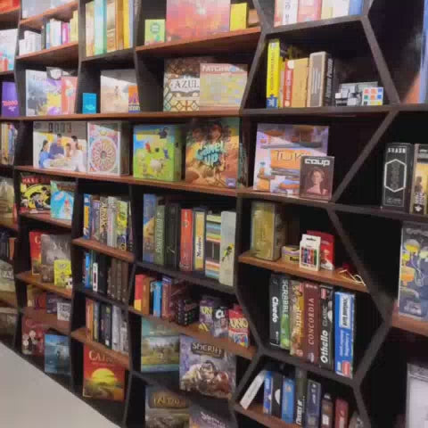 This video showcases a unique cafe with a vast collection of over 200 board games. The cafe features themed rooms, including an "Animal Kingdom Room" and an "Ancient Indian Room," offering a fun and immersive atmosphere for families and friends of all ages to enjoy quality time together.