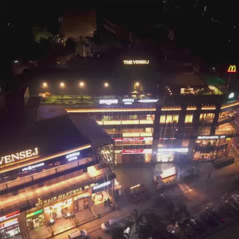 Video showcasing bowling alley, virtual reality games. mini golf, fussball, soft play area with ball pit and slides for kids, arcade games and cafe area