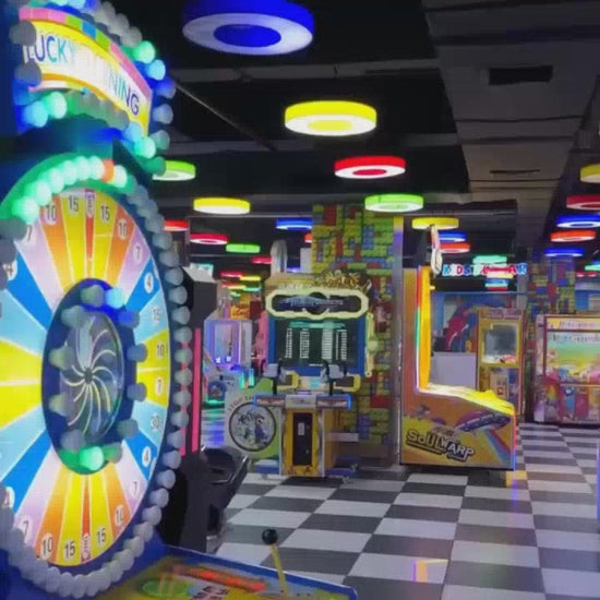 This video showcases a vibrant indoor entertainment center filled with various attractions. It features a trampoline park with a ball pit, bumper cars, VR games, a bowling alley, arcade games, and an adventure zone with rope courses and zip lines. The atmosphere is lively and fun, with people of all ages enjoying the diverse activities.