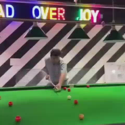 This video showcases a vibrant indoor entertainment center filled with various attractions. Young children and adults alike are seen enjoying activities like snooker, arcade games, and a ball pit. The atmosphere is lively and colorful, with bright lights and playful decor creating a fun-filled environment for all ages.