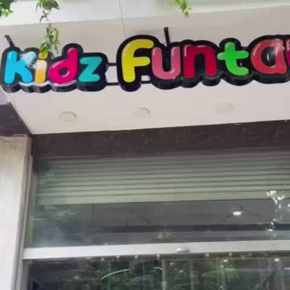 This video showcases a vibrant indoor play area filled with colorful slides, ball pits, and interactive games. Children of various ages are seen actively engaged in activities like climbing, sliding, and playing with toys, creating a lively and fun atmosphere. Notable features include LED light-up elements and a zip line, offering exciting attractions for kids.