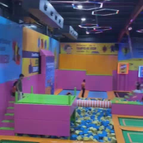 Trampoline park with jumping zones and soft play area designed for active play and enjoyable indoor entertainment.