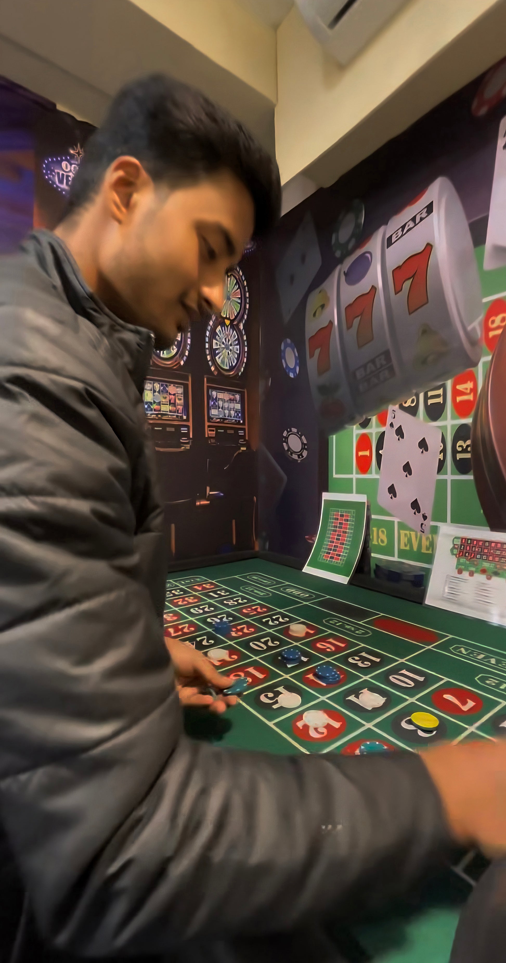 Man placing chips on casino-themed game table inside immersive No Escape Room at Rajinder Nagar Delhi